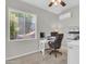 Office with a modern desk, comfortable chair, a ceiling fan, and natural light at 3029 E Patrick St, Gilbert, AZ 85295