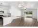 Dining area featuring an elegant chandelier and a backyard view at 3528 W Paseo Way, Laveen, AZ 85339