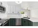 Updated kitchen with sleek countertops and stainless steel appliances at 3528 W Paseo Way, Laveen, AZ 85339