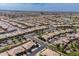 Expansive aerial shot of a residential area, showcasing the community layout and proximity to amenities at 36042 N Desert Tea Dr, Queen Creek, AZ 85140