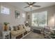 Bright office featuring a comfortable daybed, natural light, and functional decor at 36042 N Desert Tea Dr, Queen Creek, AZ 85140