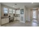 Spacious home office featuring built-in desk and storage with natural light at 36042 N Desert Tea Dr, Queen Creek, AZ 85140
