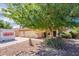 Charming single-story home with a three car garage, desert landscaping and portable storage unit at 3665 E Thames Way, San Tan Valley, AZ 85140