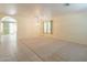 Inviting living room with a chandelier, tile entry, and an open floor plan at 3665 E Thames Way, San Tan Valley, AZ 85140
