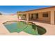 A private in-ground pool adjacent to covered patio area, offering a refreshing escape in a private backyard setting at 3665 E Thames Way, San Tan Valley, AZ 85140