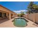 A refreshing backyard pool and covered patio, perfect for outdoor relaxation and entertaining at 3665 E Thames Way, San Tan Valley, AZ 85140