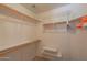 Bright walk-in closet offering shelving and ample storage solutions for an organized wardrobe at 3665 E Thames Way, San Tan Valley, AZ 85140