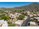 Aerial view of desert community with unique architecture, mature trees, and a peaceful residential environment at 38065 N Cave Creek Rd # 52, Cave Creek, AZ 85331