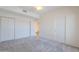 Bedroom showcasing closet doors and carpeted floors at 38065 N Cave Creek Rd # 52, Cave Creek, AZ 85331