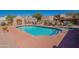 Community pool and spa offer a cool retreat, complete with shaded seating areas and lush desert surroundings at 38065 N Cave Creek Rd # 52, Cave Creek, AZ 85331