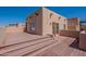 Expansive wooden deck with steps, offering a unique outdoor living space and views of the surrounding desert landscape at 38065 N Cave Creek Rd # 52, Cave Creek, AZ 85331
