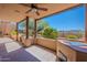 Covered patio with ceiling fan, outdoor kitchen and scenic desert view at 38065 N Cave Creek Rd # 52, Cave Creek, AZ 85331