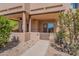 Private patio with desert landscaping and shaded seating area, ideal for outdoor relaxation at 38065 N Cave Creek Rd # 52, Cave Creek, AZ 85331