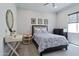 Bedroom with carpet, sleek decor, dresser, window, and vanity station at 3813 N 37Th St, Phoenix, AZ 85018