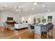 Bright living room with hardwood floors, modern furniture, and an open layout perfect for entertaining at 3817 E Highland Ave, Phoenix, AZ 85018