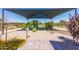 Community playground with colorful play structures and a soft sand base at 3892 E Harrison St, Gilbert, AZ 85295