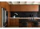 Well-appointed kitchen featuring sleek cabinets, stainless steel appliances, and a stylish island with bar seating at 4032 N 45Th Pl, Phoenix, AZ 85018
