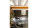 Bright living room featuring exposed beam ceilings and sleek, modern furniture at 4032 N 45Th Pl, Phoenix, AZ 85018