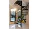 Unique spiral staircase leading to an outdoor patio with desert views at 4032 N 45Th Pl, Phoenix, AZ 85018