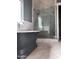 Modern bathroom showcases soaking tub, patterned shower tiles, and elegant fixtures at 4132 N 42Nd St, Phoenix, AZ 85018