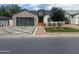 Charming home with well-manicured lawn and landscaping provides superb curb appeal at 4132 N 42Nd St, Phoenix, AZ 85018