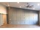 Large living space with wood floors features decorative wall accents and recessed lighting at 4132 N 42Nd St, Phoenix, AZ 85018