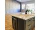Open-concept living area is adjacent to the kitchen with a wine cooler and counter seating at 4132 N 42Nd St, Phoenix, AZ 85018
