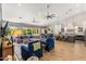 Open-concept living space featuring comfortable seating and an adjacent modern kitchen with bar seating at 4132 N 42Nd St, Phoenix, AZ 85018