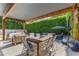Outdoor dining area with a covered patio, dining table, and a view of the pool at 4132 N 42Nd St, Phoenix, AZ 85018