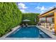 Private backyard pool with waterfall feature and lounge chairs at 4132 N 42Nd St, Phoenix, AZ 85018