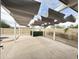 Outdoor area features a modern shade structure, offering a stylish and functional space for relaxation and entertaining at 4234 E Winnetka Dr, Phoenix, AZ 85044