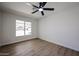 This room features neutral paint, wood flooring, and natural light, offering a blank slate at 4234 E Winnetka Dr, Phoenix, AZ 85044