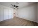This room features neutral paint, wood flooring, and double door closet, offering versatility at 4234 E Winnetka Dr, Phoenix, AZ 85044