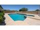 Inviting pool and spa surrounded by a spacious patio, creating a perfect backyard retreat at 4234 E Winnetka Dr, Phoenix, AZ 85044