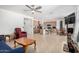 Open-concept living space with kitchen, breakfast nook, and living area at 44157 W Palo Amarillo Rd, Maricopa, AZ 85138