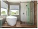 Modern bathroom featuring a freestanding tub, glass shower with a uniquely tiled wall, and wood-look tile flooring at 4434 E Bannock St, Phoenix, AZ 85044