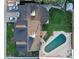 Aerial view of a house with a pool and a spacious backyard at 4644 W Berridge Ln, Glendale, AZ 85301