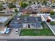 Aerial view of home showing front yard, driveway, and blue exterior paint at 4644 W Berridge Ln, Glendale, AZ 85301
