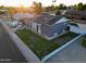 Beautiful single-Gathering residence with a pristine lawn and a classic architectural style in a desirable neighborhood at 4644 W Berridge Ln, Glendale, AZ 85301