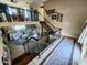 Spacious foyer with an ornate wrought iron railing, stairs, and an open floor plan at 4644 W Berridge Ln, Glendale, AZ 85301