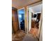 Hallway leading to bedrooms with tile flooring at 4644 W Berridge Ln, Glendale, AZ 85301