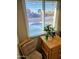 View from the window showing the pool in the backyard, along with indoor plants at 4644 W Berridge Ln, Glendale, AZ 85301