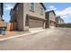 A quiet street presents homes with garages, complemented by neat landscaping and curbside appeal at 5741 W Warner St, Phoenix, AZ 85043