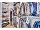 Spacious walk-in closet with organized shelving and hanging storage at 5741 W Warner St, Phoenix, AZ 85043