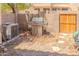 Backyard with a gas grill, AC unit and gravel, perfect for outdoor cooking and entertaining at 921 W University Dr # 1191, Mesa, AZ 85201