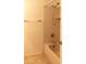 Bathroom with tile shower/tub combination, beige tile and neutral paint at 921 W University Dr # 1191, Mesa, AZ 85201