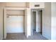 Neutral painted bedroom with closet, plush carpet, and an open door to the hall at 921 W University Dr # 1191, Mesa, AZ 85201