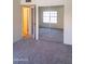Spacious bedroom with a large mirrored closet and an open door leading to the bathroom at 921 W University Dr # 1191, Mesa, AZ 85201