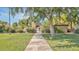 Attractive community entrance with lush landscaping and walkways at 921 W University Dr # 1191, Mesa, AZ 85201