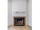 Close-up of a classic fireplace with a tile surround and mantel at 921 W University Dr # 1191, Mesa, AZ 85201